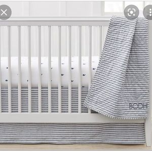 Pottery Barn Kids bumper cover and crib skirt